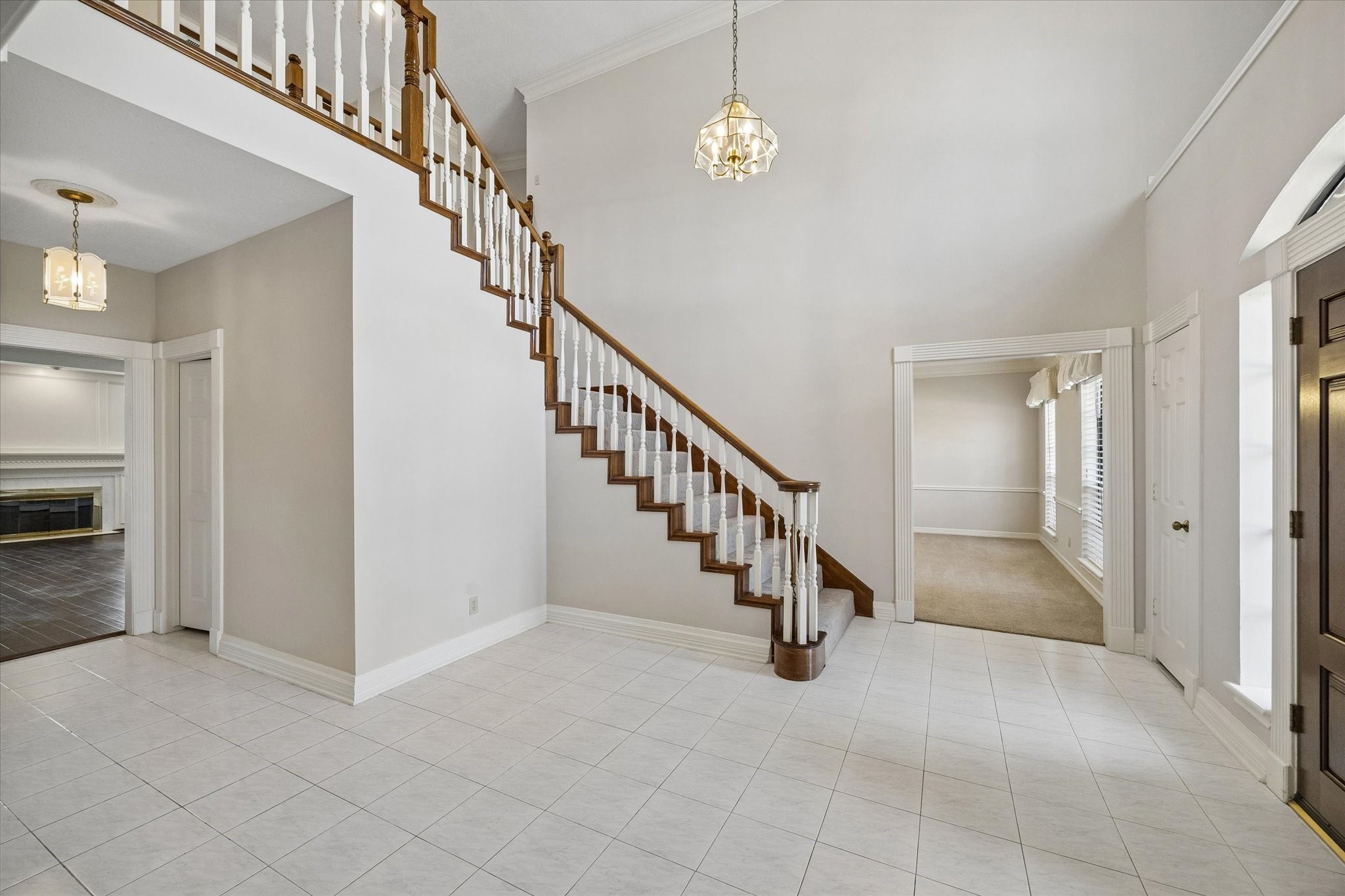 1707 Rambling Stone Drive Richmond, TX 77406 - Photo 6 of 42 a view of entryway and hall with a chandelier