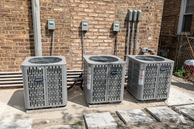 a view of a porch with a table and chairs