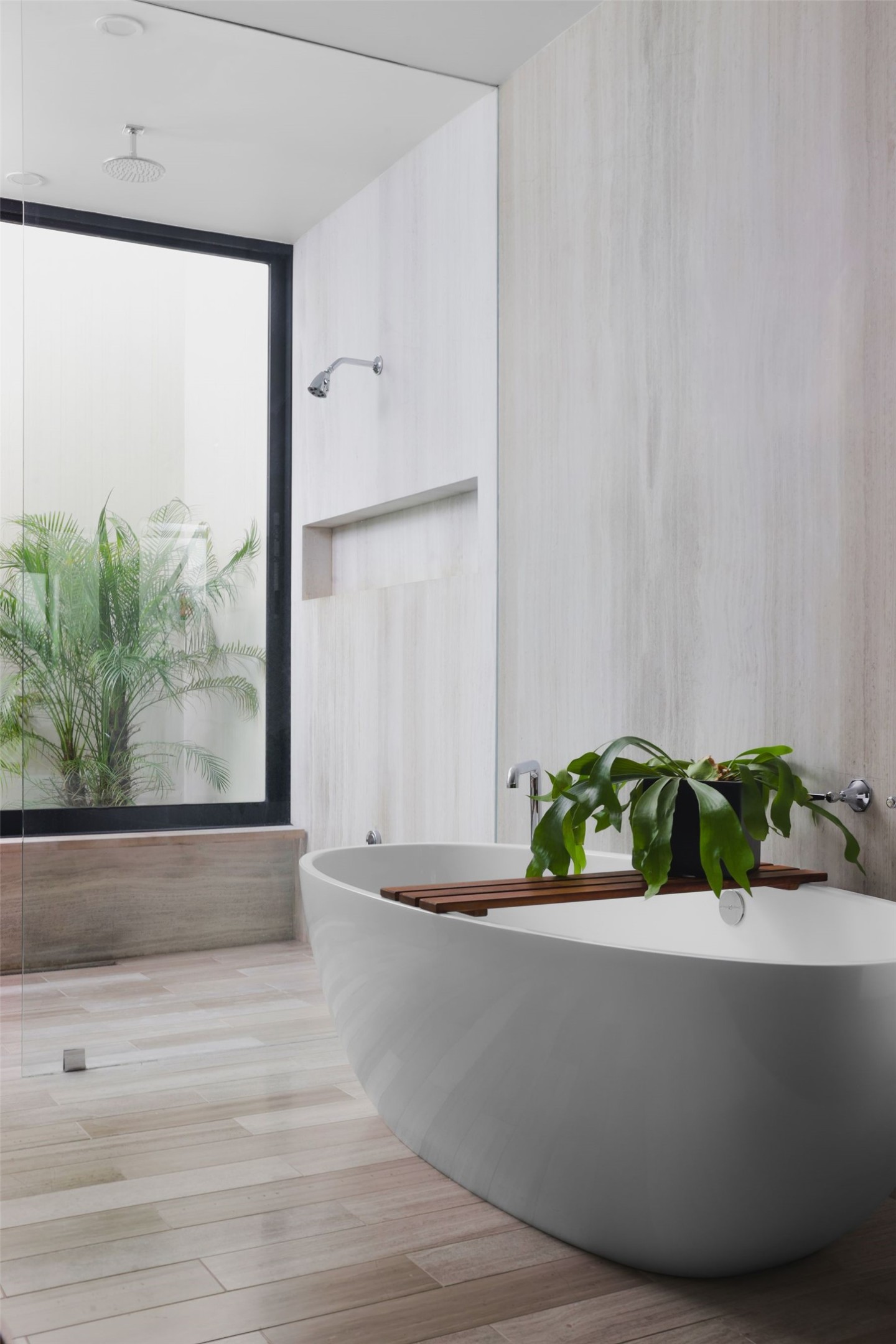 303 Farley Trail Austin, TX 78746 - Photo 12 of 18 a white bath tub sitting in a bathroom