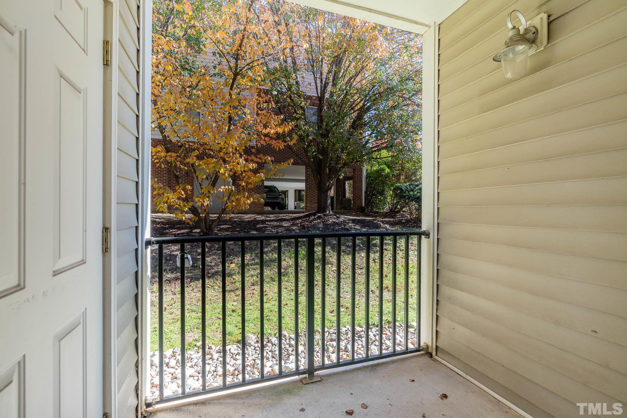 2631 Oldgate Drive, Unit 103 Raleigh, NC 27604 - Photo 13 of 15 a view of a balcony with tree