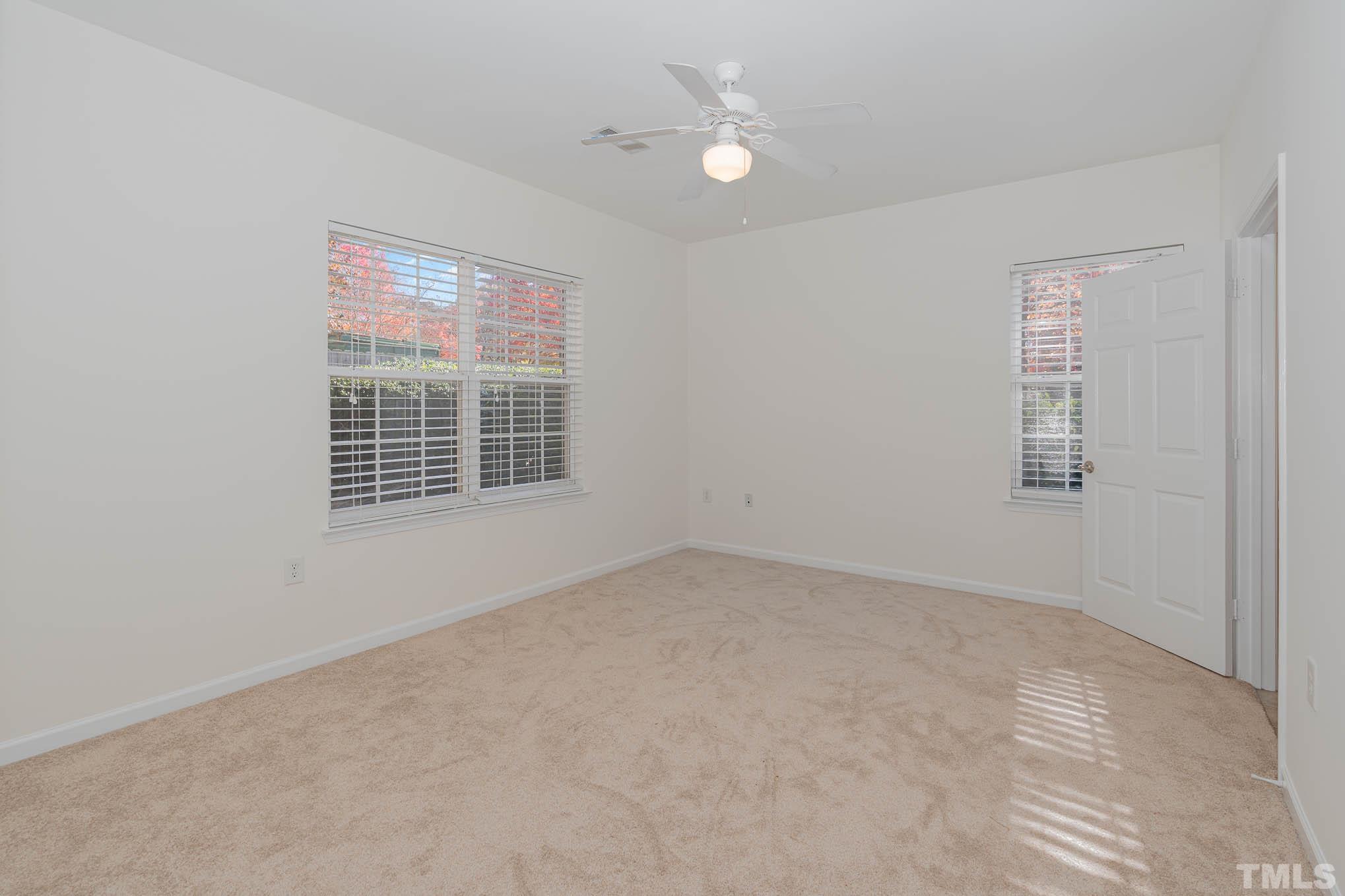 2631 Oldgate Drive, Unit 103 Raleigh, NC 27604 - Photo 10 of 15 an empty room with windows