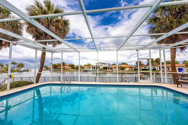 a view of a lake and a yard