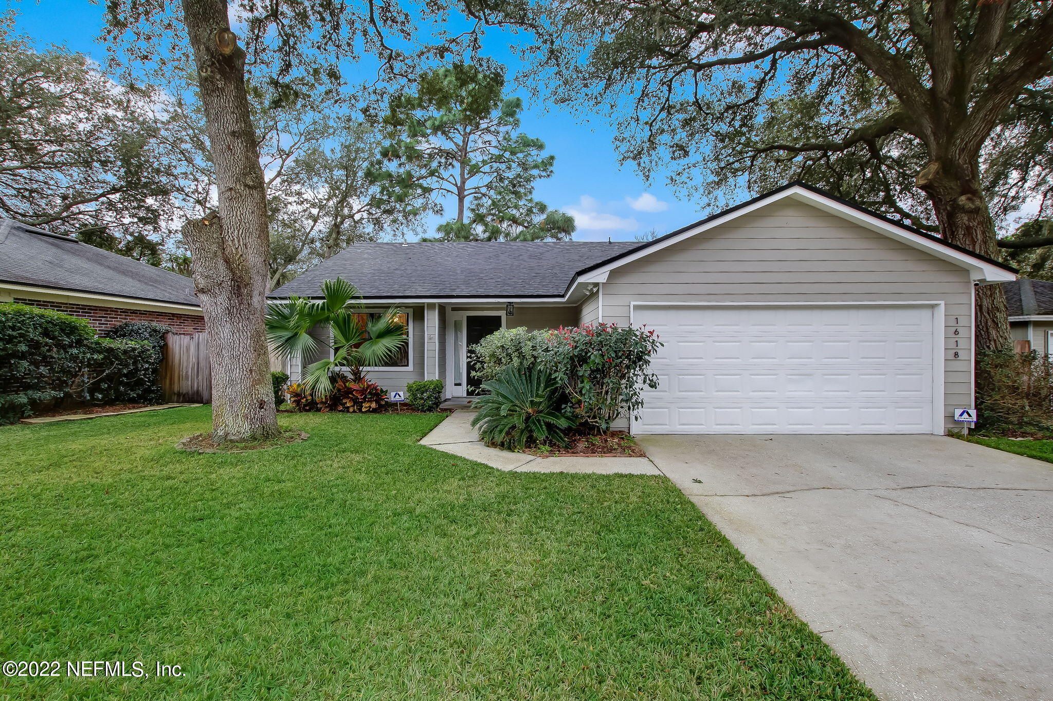 1618 Panther Ridge Court Jacksonville, FL 32225 - Photo 1 of 46 a front view of house with yard and green space
