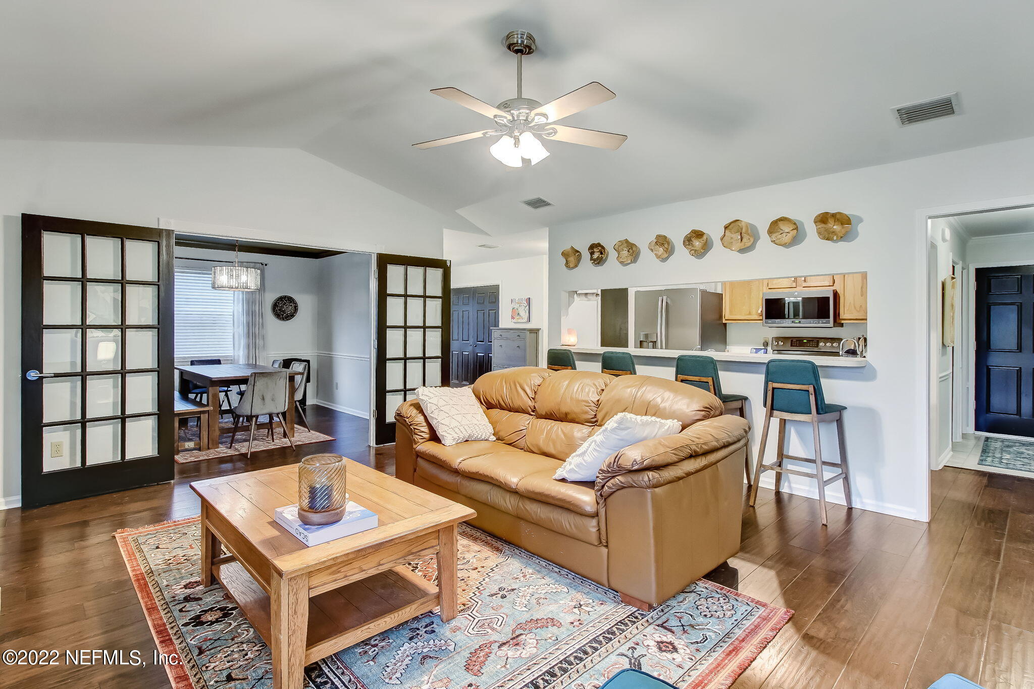1618 Panther Ridge Court Jacksonville, FL 32225 - Photo 12 of 46 a living room with furniture and wooden floor
