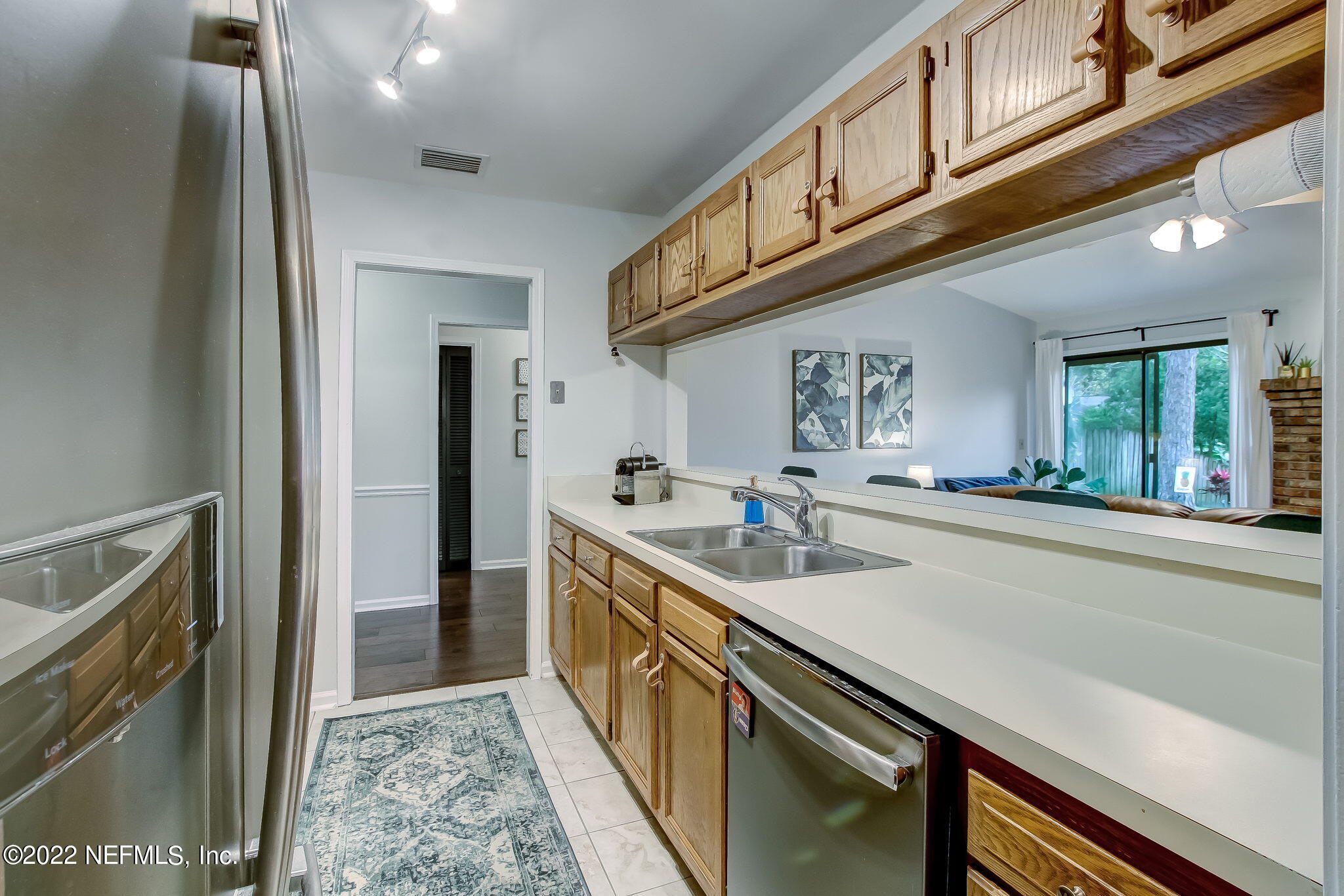 1618 Panther Ridge Court Jacksonville, FL 32225 - Photo 17 of 46 a kitchen with stainless steel appliances granite countertop a sink and cabinets