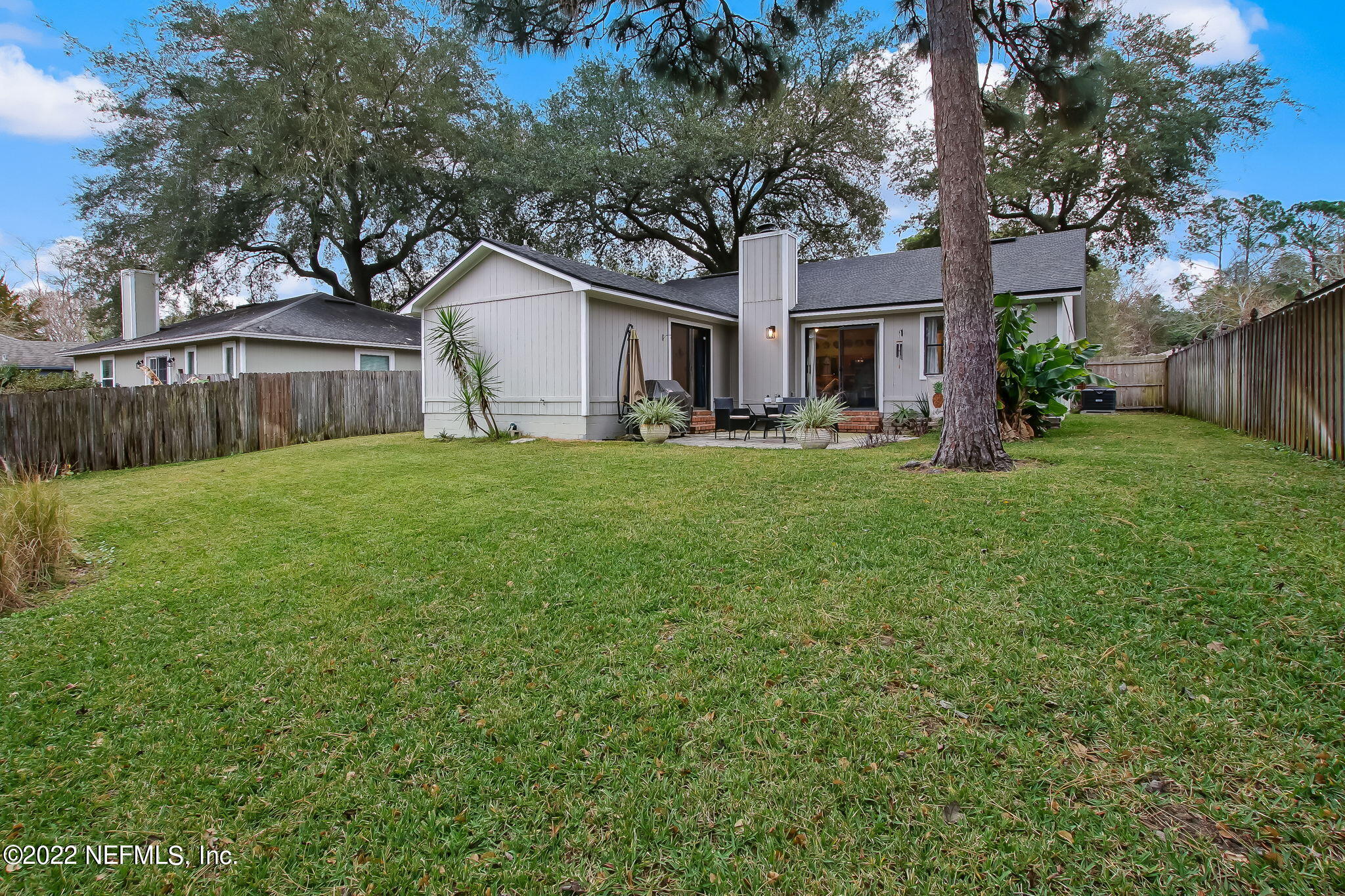 1618 Panther Ridge Court Jacksonville, FL 32225 - Photo 43 of 46 a house view with a sitting space and garden