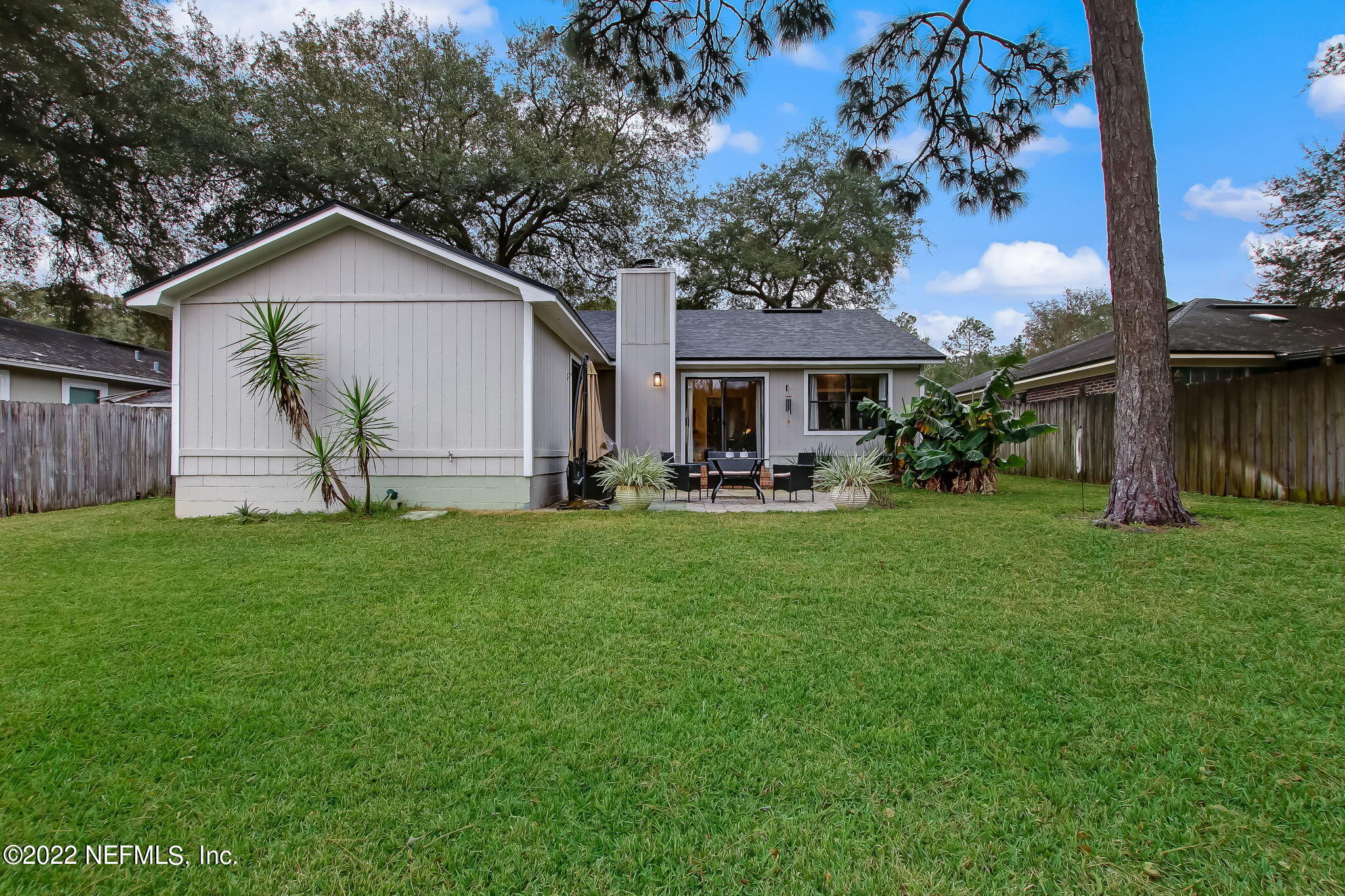 1618 Panther Ridge Court Jacksonville, FL 32225 - Photo 44 of 46 a view of a house with back yard and a garden