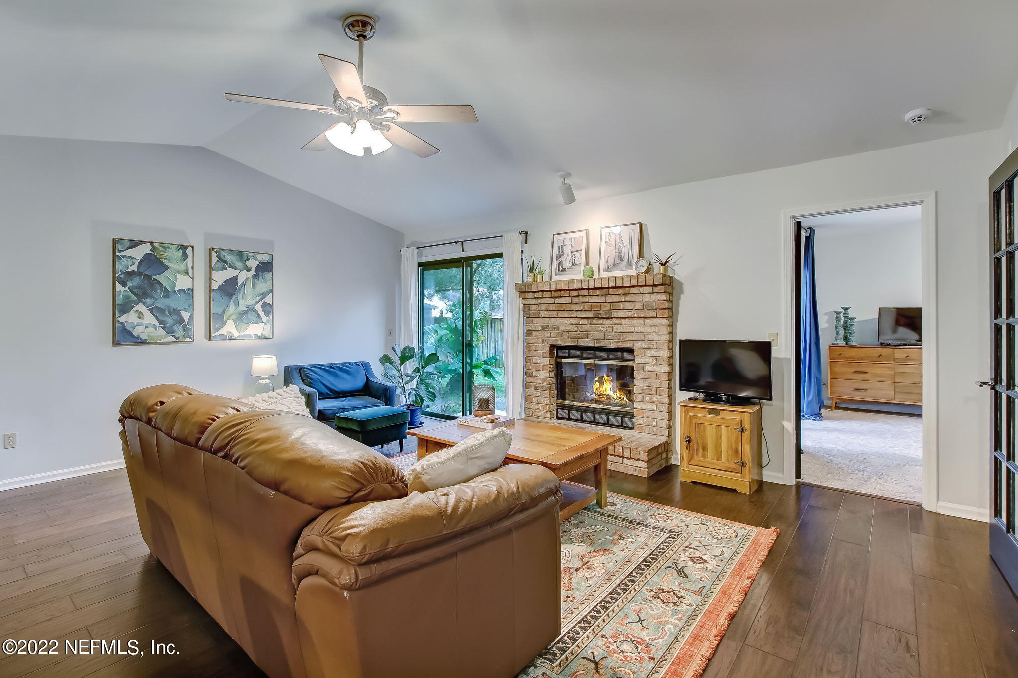1618 Panther Ridge Court Jacksonville, FL 32225 - Photo 10 of 46 a living room with furniture and a fireplace