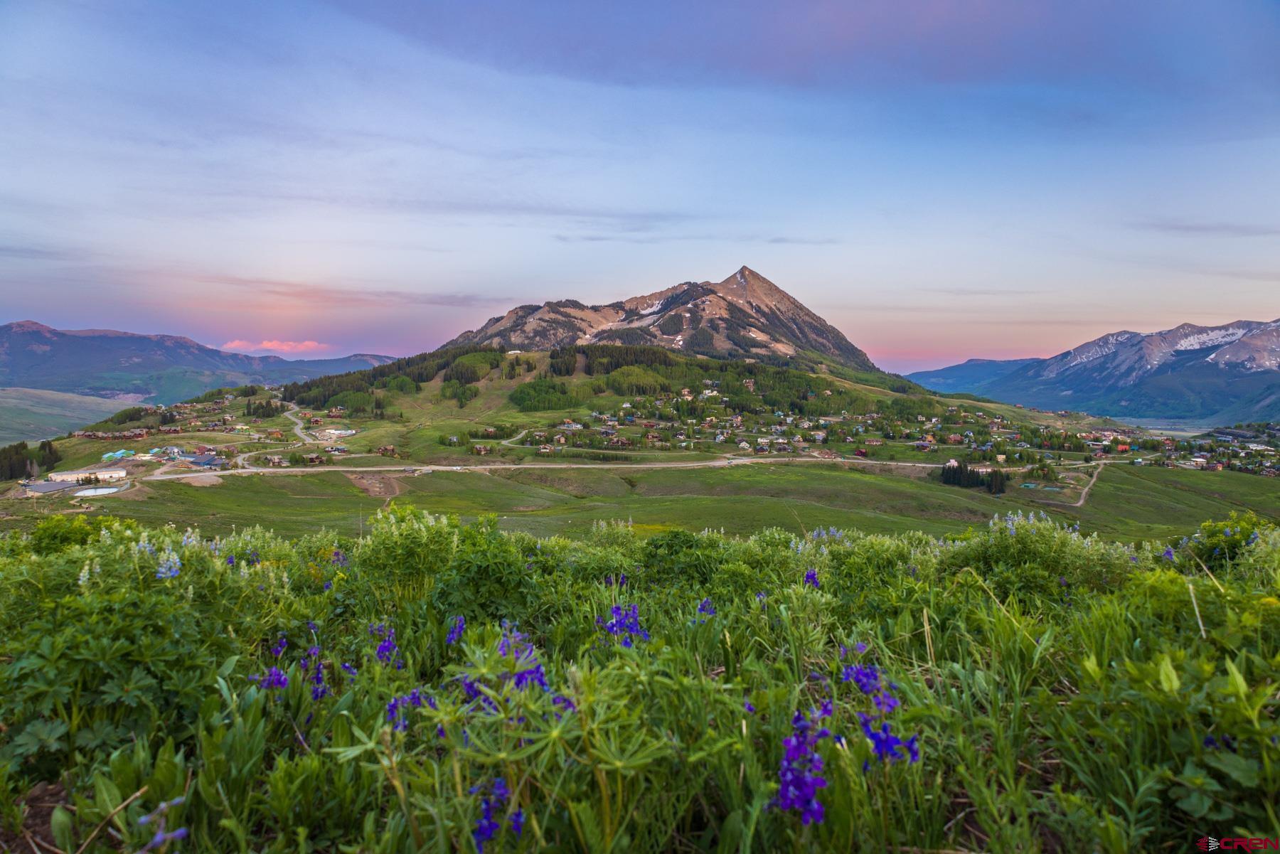 E24 Prospect Drive Crested Butte, CO 81225 - Photo 15 of 36 a view of a lake with a mountain in the background