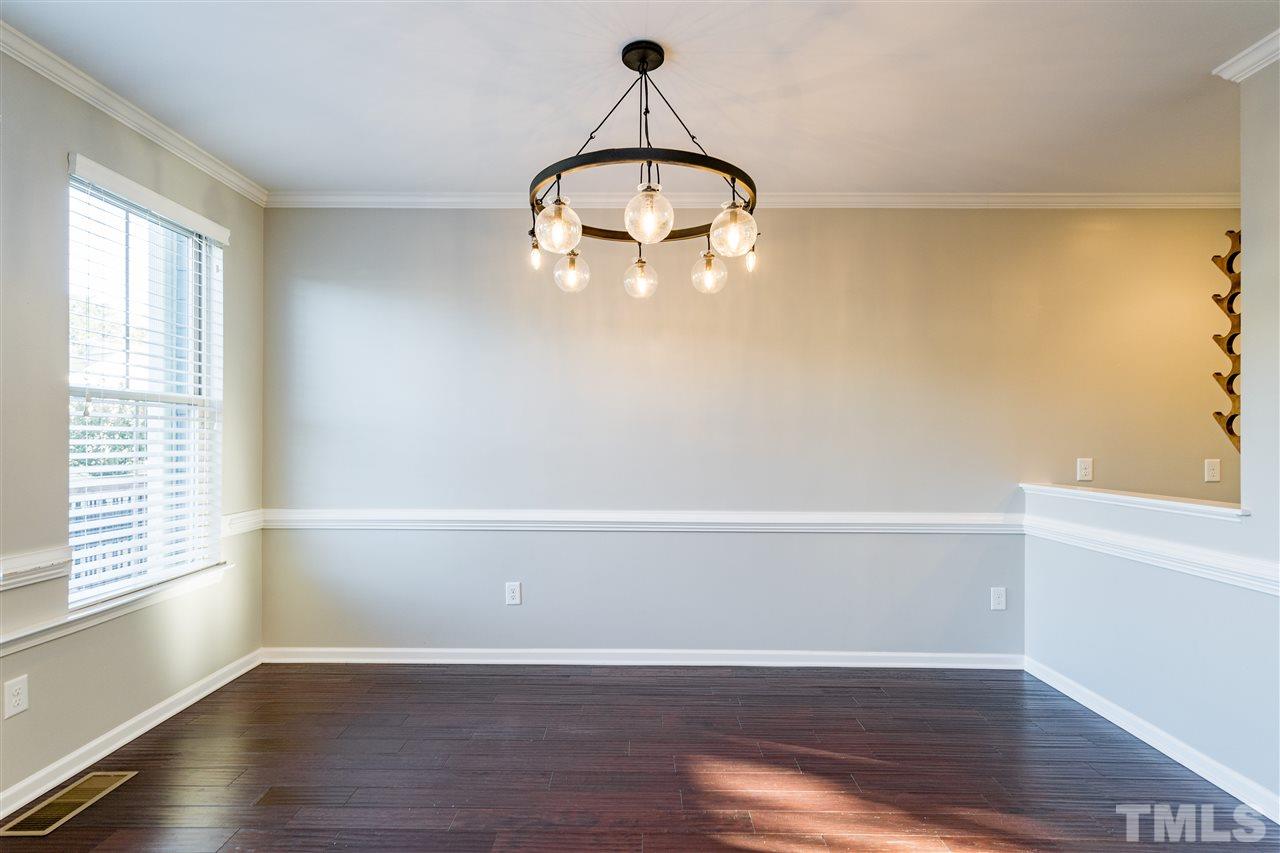 1521 Rodessa Run Raleigh, NC 27607 - Photo 15 of 29 View from the dining area overlooks one of three pocket parks in the community---green space, trees and swings!