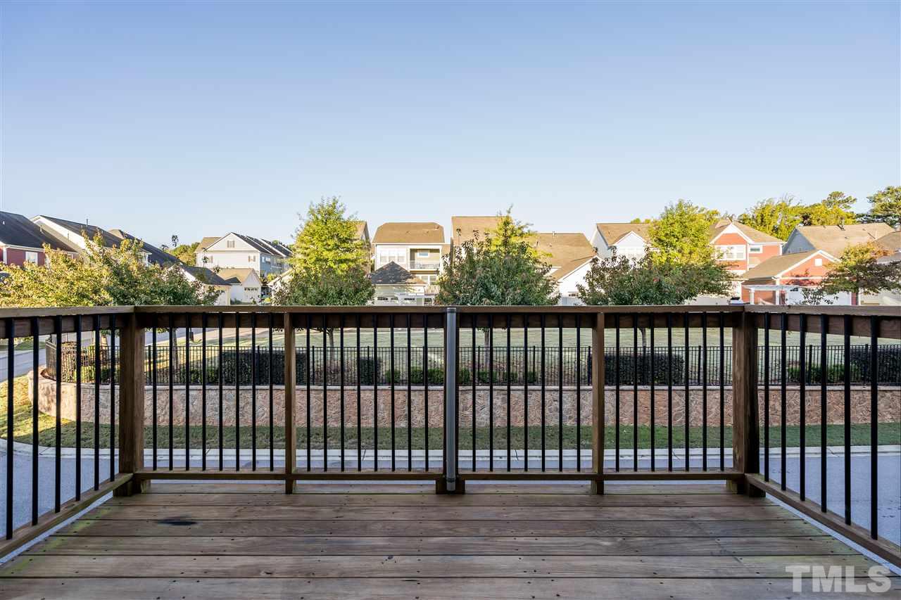 1521 Rodessa Run Raleigh, NC 27607 - Photo 19 of 29 Back deck opens off the dining area and overlooks the sunset and pocket park.