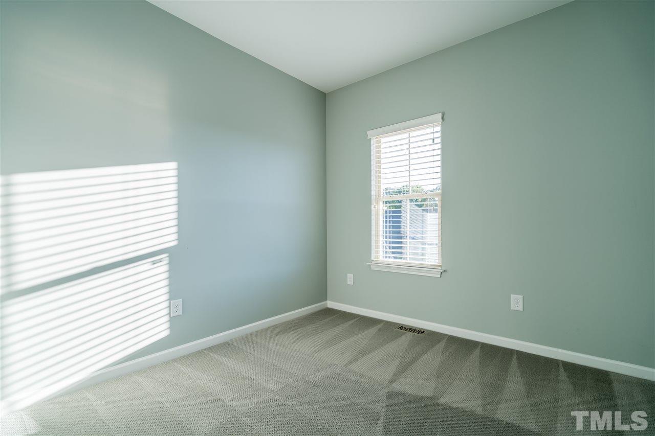 1521 Rodessa Run Raleigh, NC 27607 - Photo 25 of 29 Blinds, neutral paint, freshly cleaned carpet, this bedroom is ready to go!