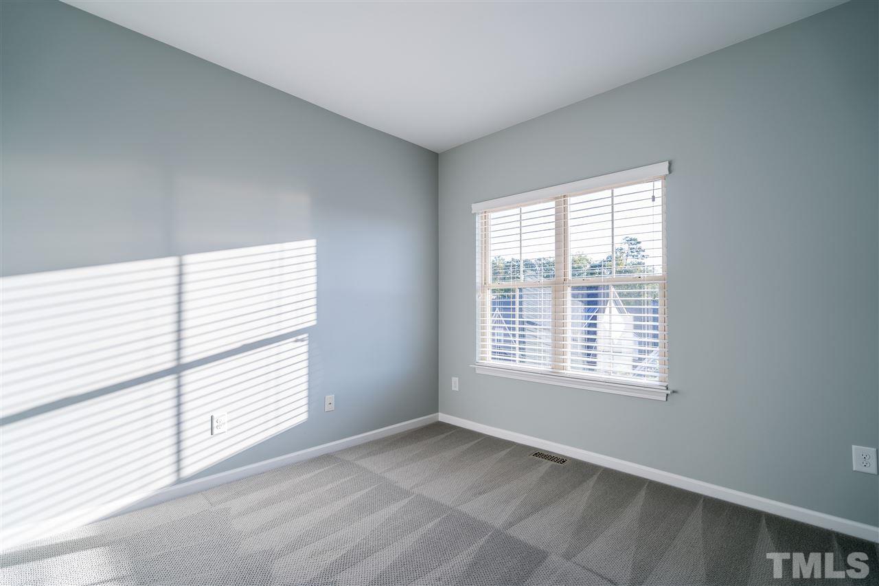 1521 Rodessa Run Raleigh, NC 27607 - Photo 27 of 29 Blinds, neutral paint, freshly cleaned carpet, this bedroom is ready to go!