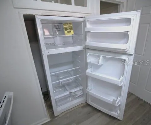 a storage room with washer and dryer