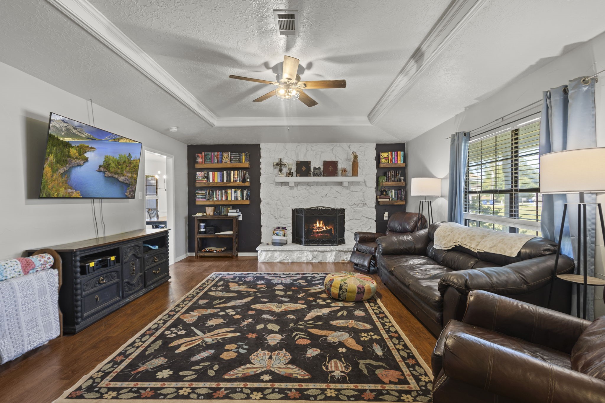 125 Williams Road Lumberton, TX 77657 - Photo 8 of 22 a living room with furniture or couch and a fireplace