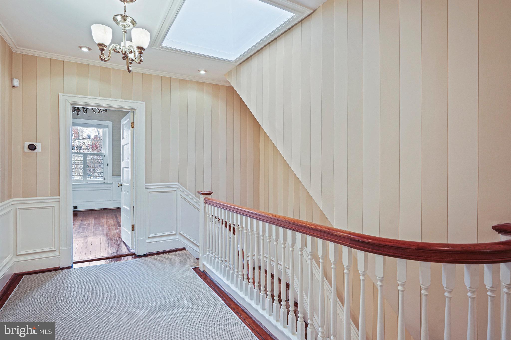 1850 Kalorama Road Northwest, Unit A Washington, DC 20009 - Photo 12 of 35 2nd level landing with skylight