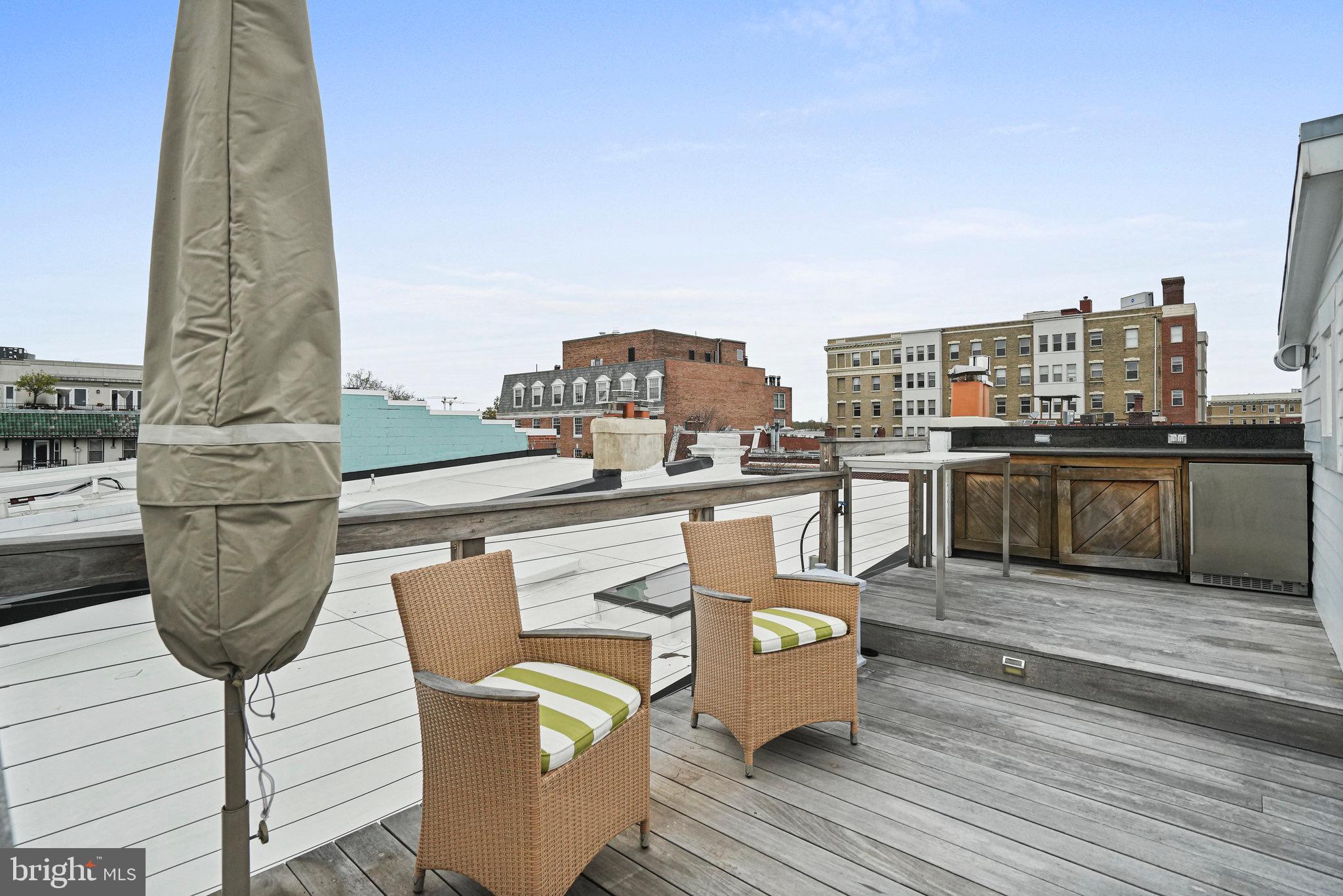 1850 Kalorama Road Northwest, Unit A Washington, DC 20009 - Photo 32 of 35 Lounge area and wet bar with wine fridge