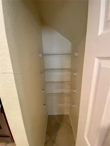 a bathroom with a sink a mirror and a toilet