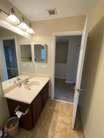 a sign on the side of the road