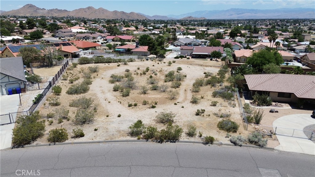 47333203 Muni Road Apple Valley, CA 92307 - Photo 7 of 21 an aerial view of a house with a yard