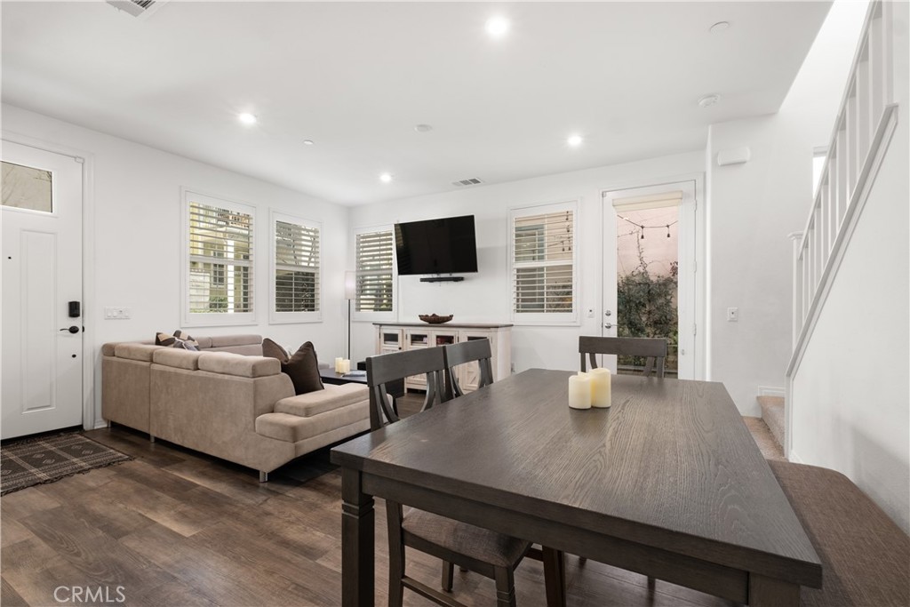 166 Natal Road Rancho Mission Viejo, CA 92694 - Photo 13 of 56 a living room with furniture flat screen tv and large window