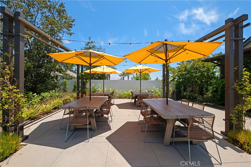 166 Natal Road Rancho Mission Viejo, CA 92694 - Photo 39 of 56 an outdoor space with furniture and umbrella
