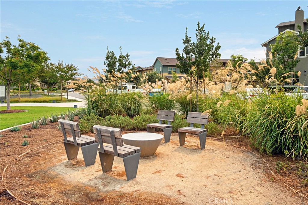 166 Natal Road Rancho Mission Viejo, CA 92694 - Photo 42 of 56 a view of a patio with a table and chairs