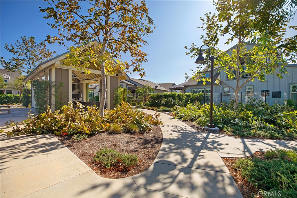 166 Natal Road Rancho Mission Viejo, CA 92694 - Photo 44 of 56 a front view of a multi story residential apartment building