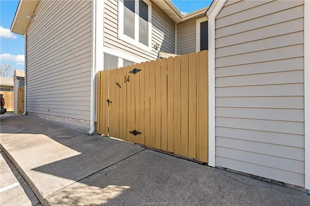 a view of a door and a yard