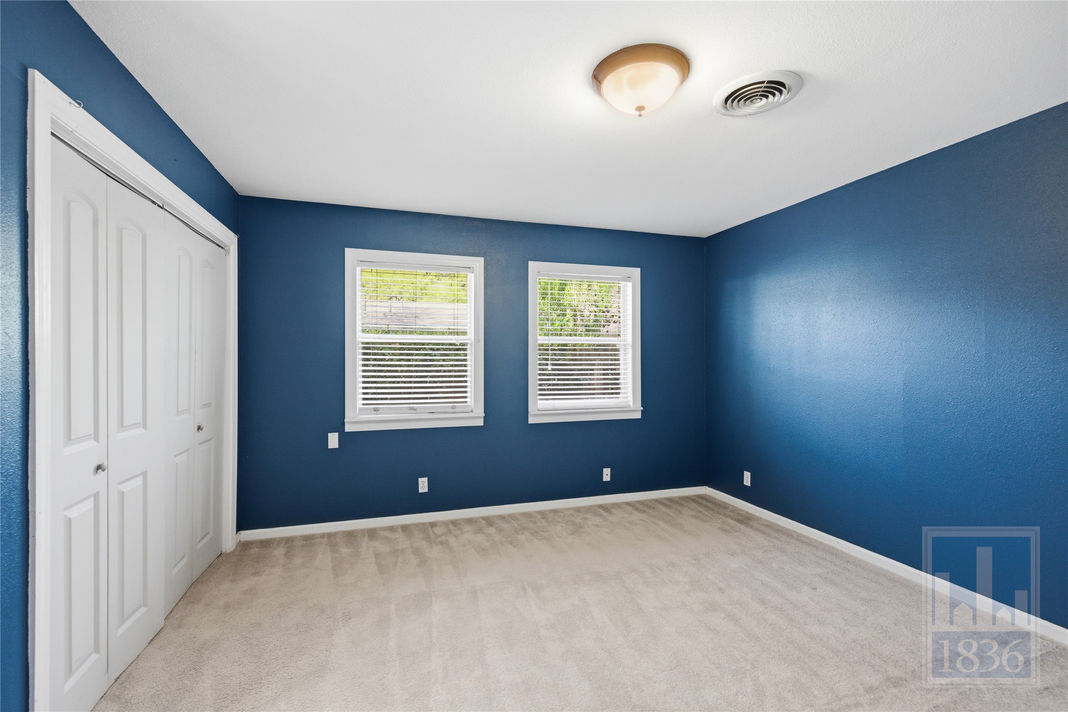 2416 South 5th Street, Unit B Austin, TX 78704 - Photo 11 of 28 an empty room with windows