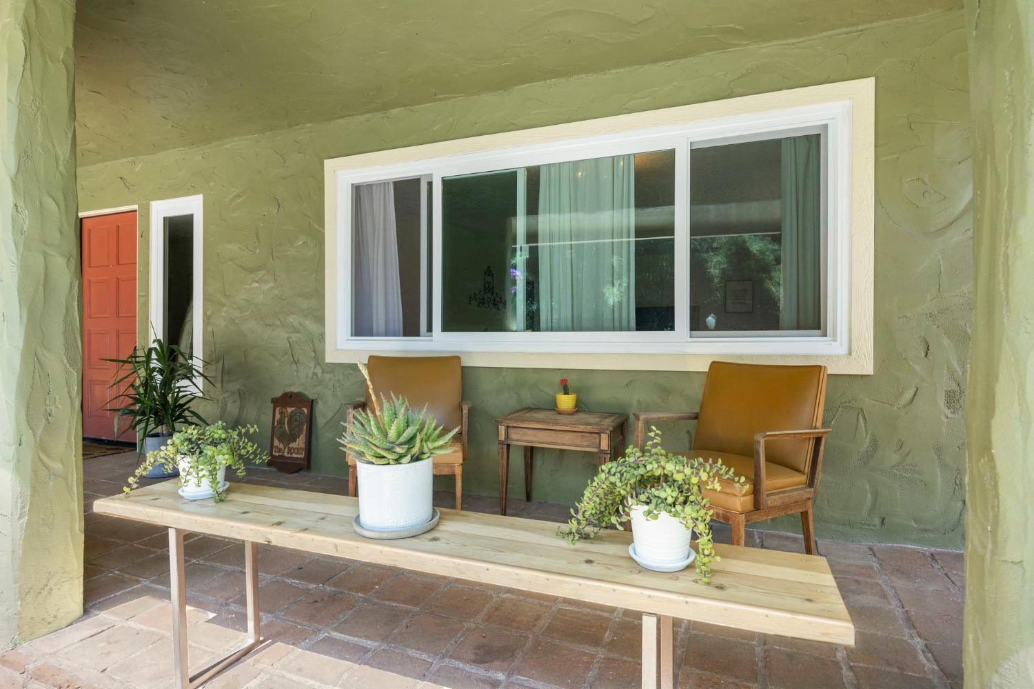 80 High Street Oak View, CA 93022 - Photo 17 of 93 a view of a house with chair and potted plant