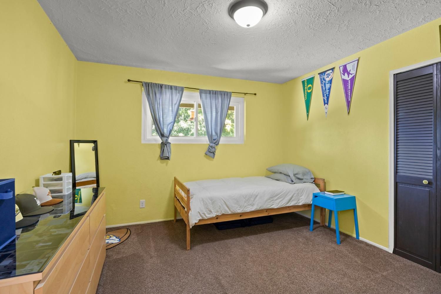 80 High Street Oak View, CA 93022 - Photo 22 of 93 a bedroom with a bed and wooden floor