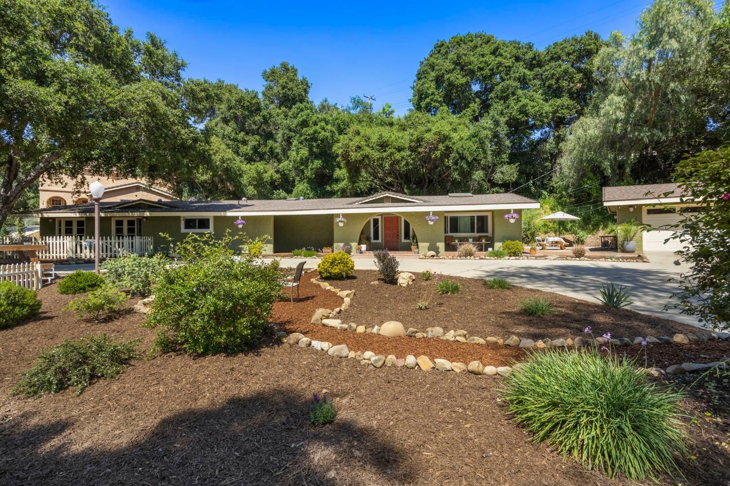 80 High Street Oak View, CA 93022 - Photo 7 of 93 a view of a yard with plants and trees