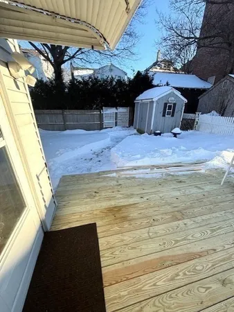 a view of a backyard of the house