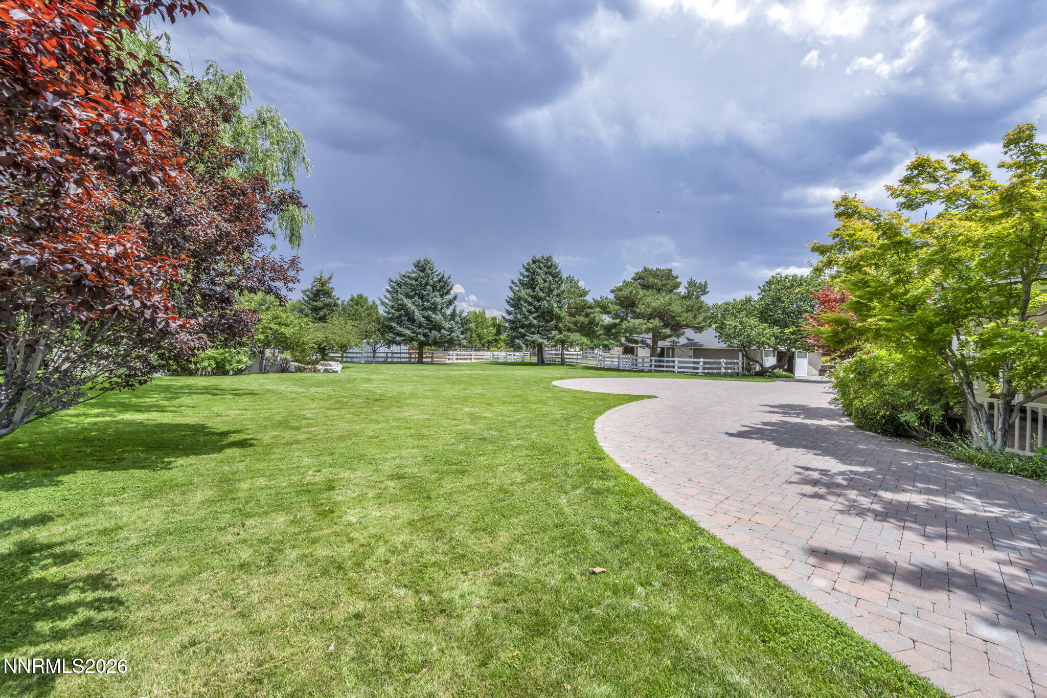 4010 Canyon Drive Reno, NV 89519 - Photo 115 of 147 a view of a garden with a building in the background