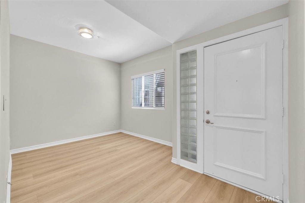 2243 Martin Irvine, CA 92612 - Photo 12 of 36 wooden floor in an empty room with a window