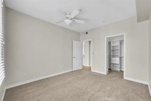 an empty room with a bathroom