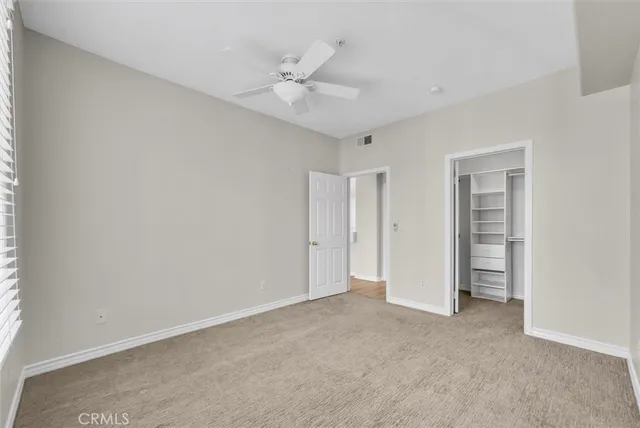 an empty room with a bathroom