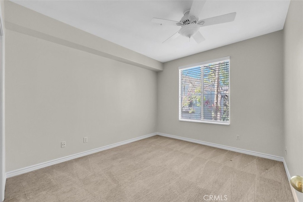 2243 Martin Irvine, CA 92612 - Photo 26 of 36 an empty room with a window and a ceiling fan