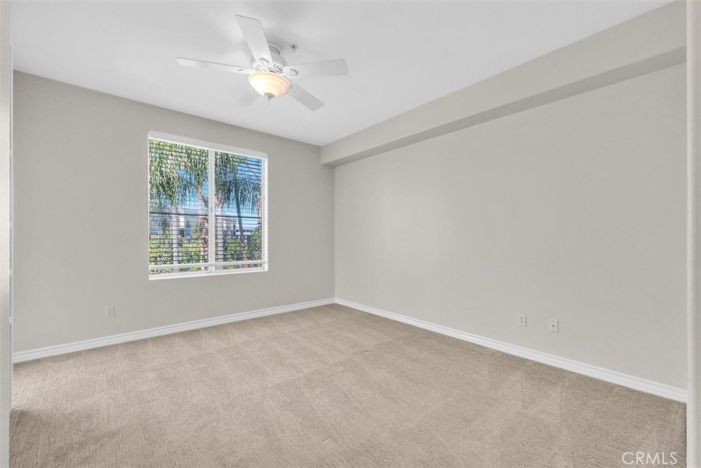 2243 Martin Irvine, CA 92612 - Photo 31 of 36 an empty room with a window and a ceiling fan