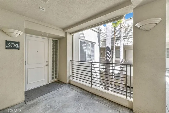 a view of a door and a window