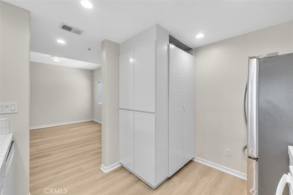 2243 Martin Irvine, CA 92612 - Photo 7 of 36 a view of hallway with wooden floor