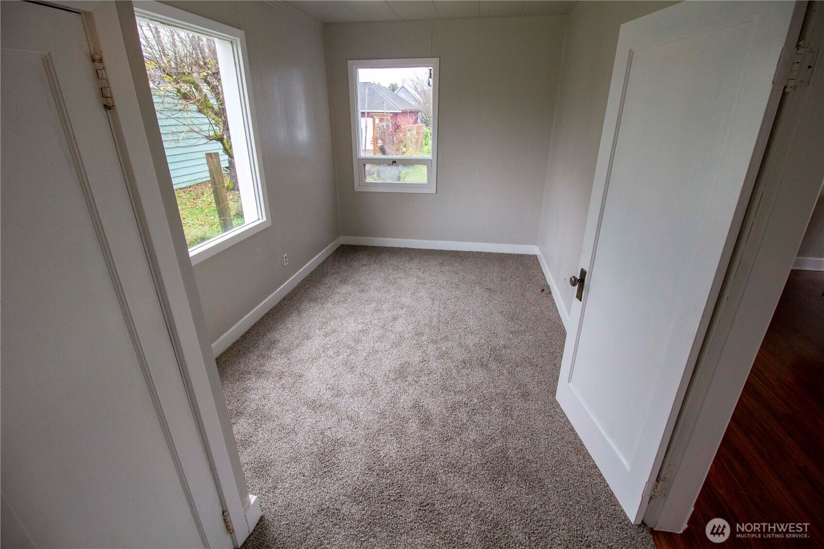 412 5th Street Hoquiam, WA 98550 - Photo 15 of 17 a view of hallway with window and stairs