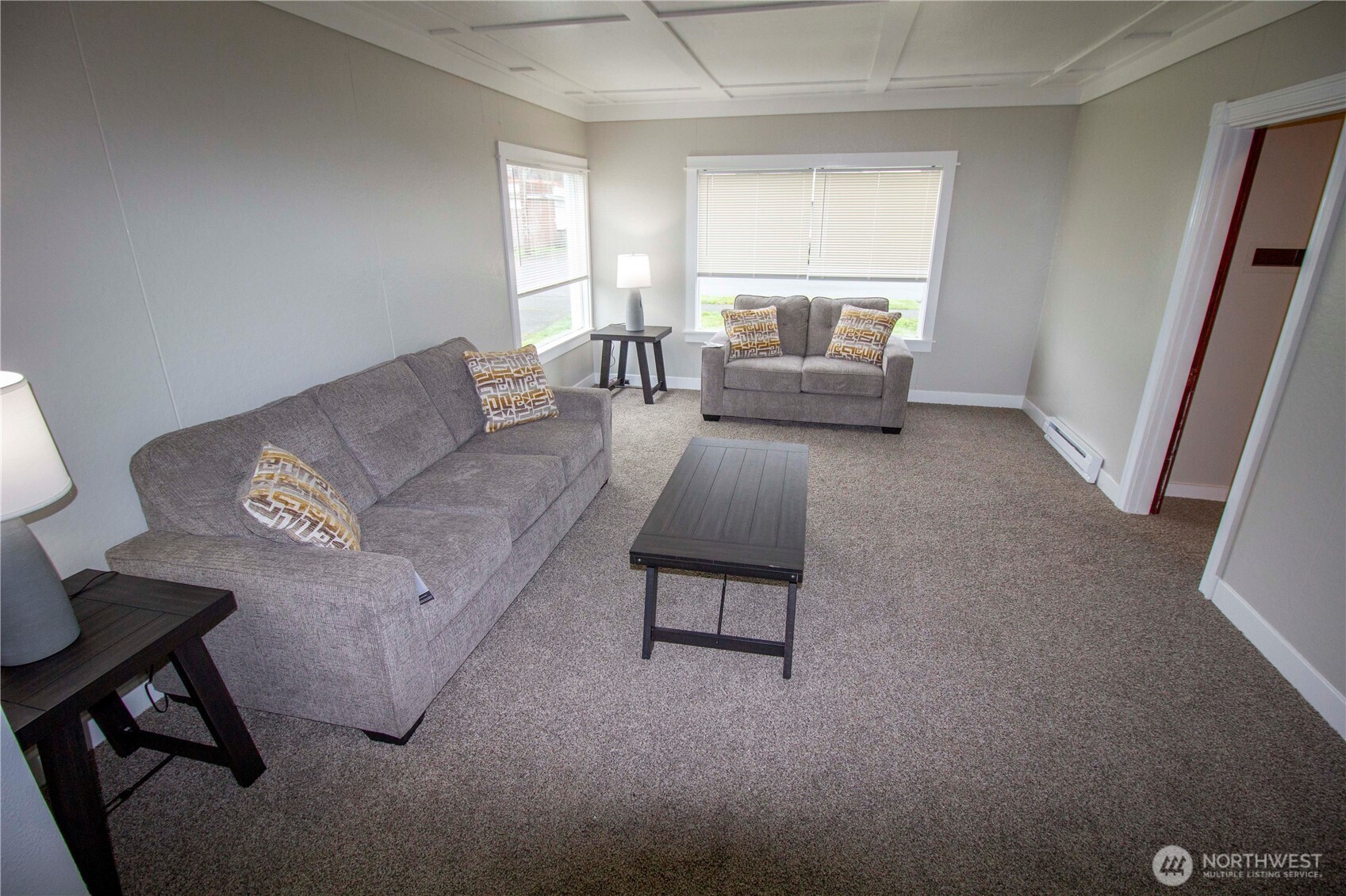 412 5th Street Hoquiam, WA 98550 - Photo 5 of 17 a living room with furniture and a window