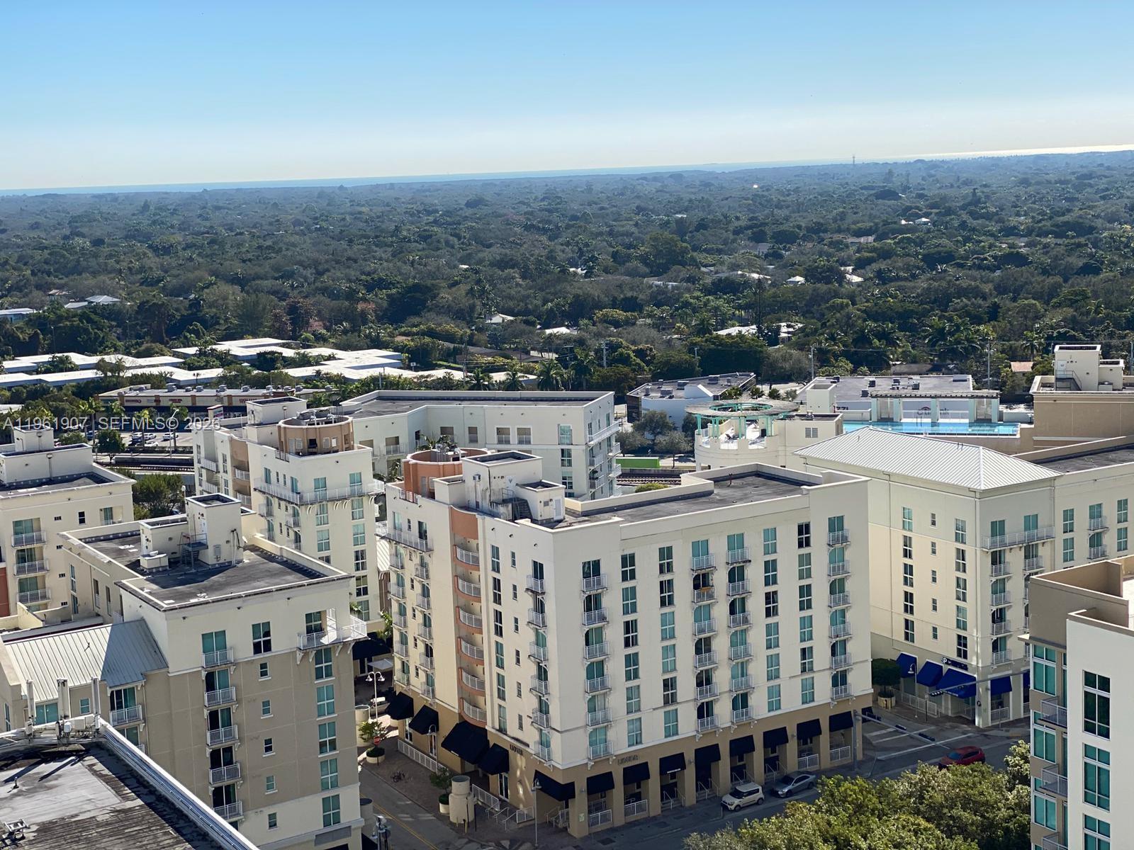 7350 Southwest 89th Street, Unit 2104S Miami, FL 33156 - Photo 27 of 30 a view of city with tall buildings