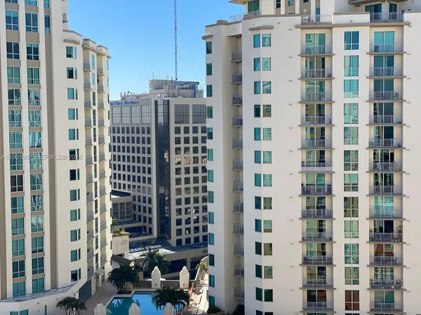 a view of a city with tall buildings