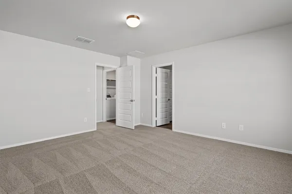a bathroom with a shower sink and mirror