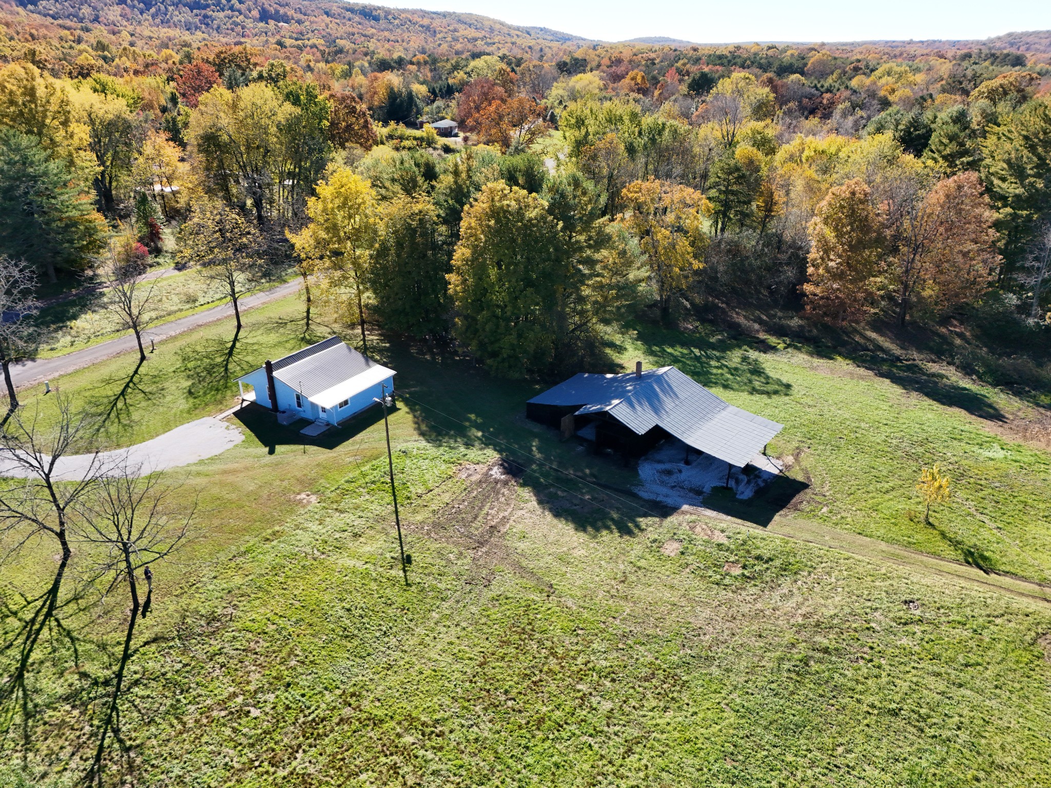65 Duck Pond Road Palmer, TN 37365 - Photo 19 of 25 a wooden bench sitting in the middle of a yard