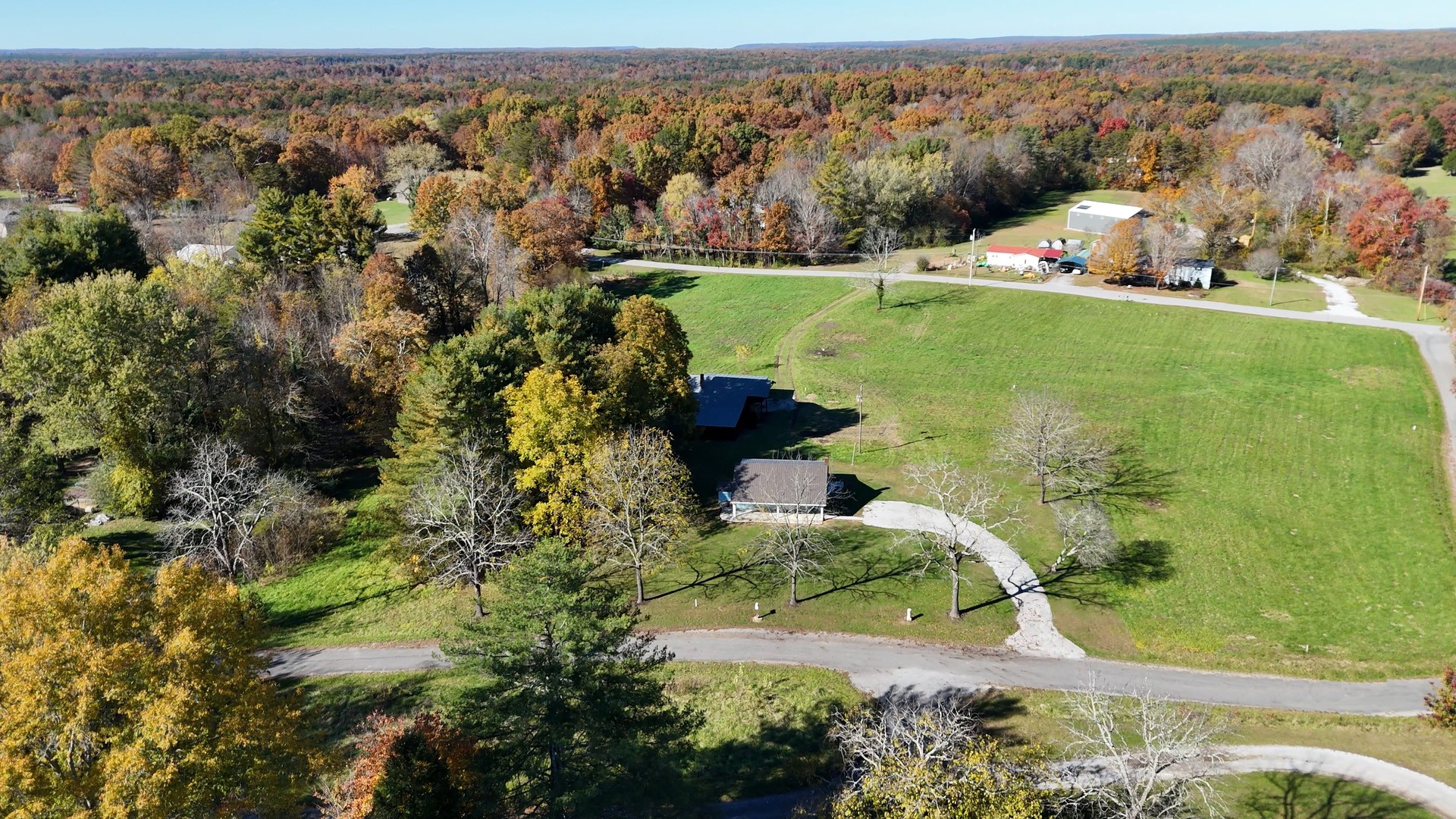 65 Duck Pond Road Palmer, TN 37365 - Photo 2 of 25 an aerial view of a houses with a yard