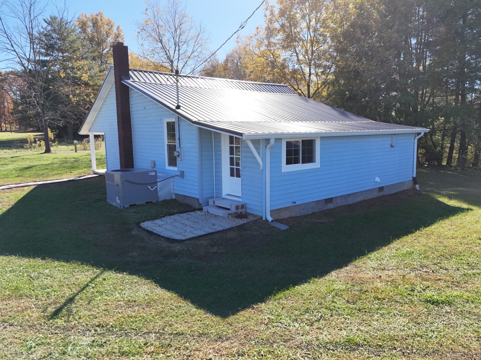 65 Duck Pond Road Palmer, TN 37365 - Photo 21 of 25 a backyard of a house with barbeque oven